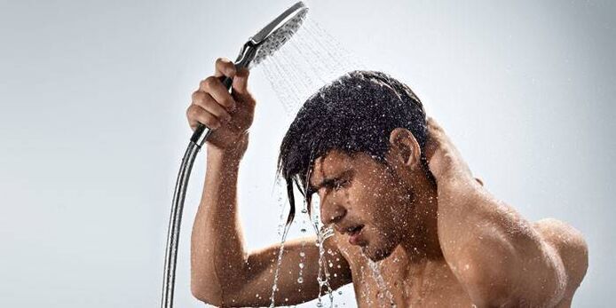 A man takes a contrast shower to increase blood flow and increase potency